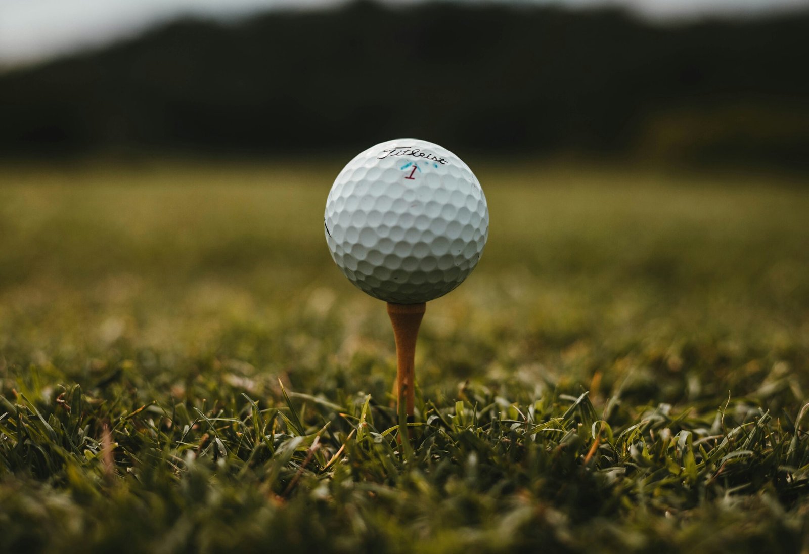 Close up of a golf ball on a tee